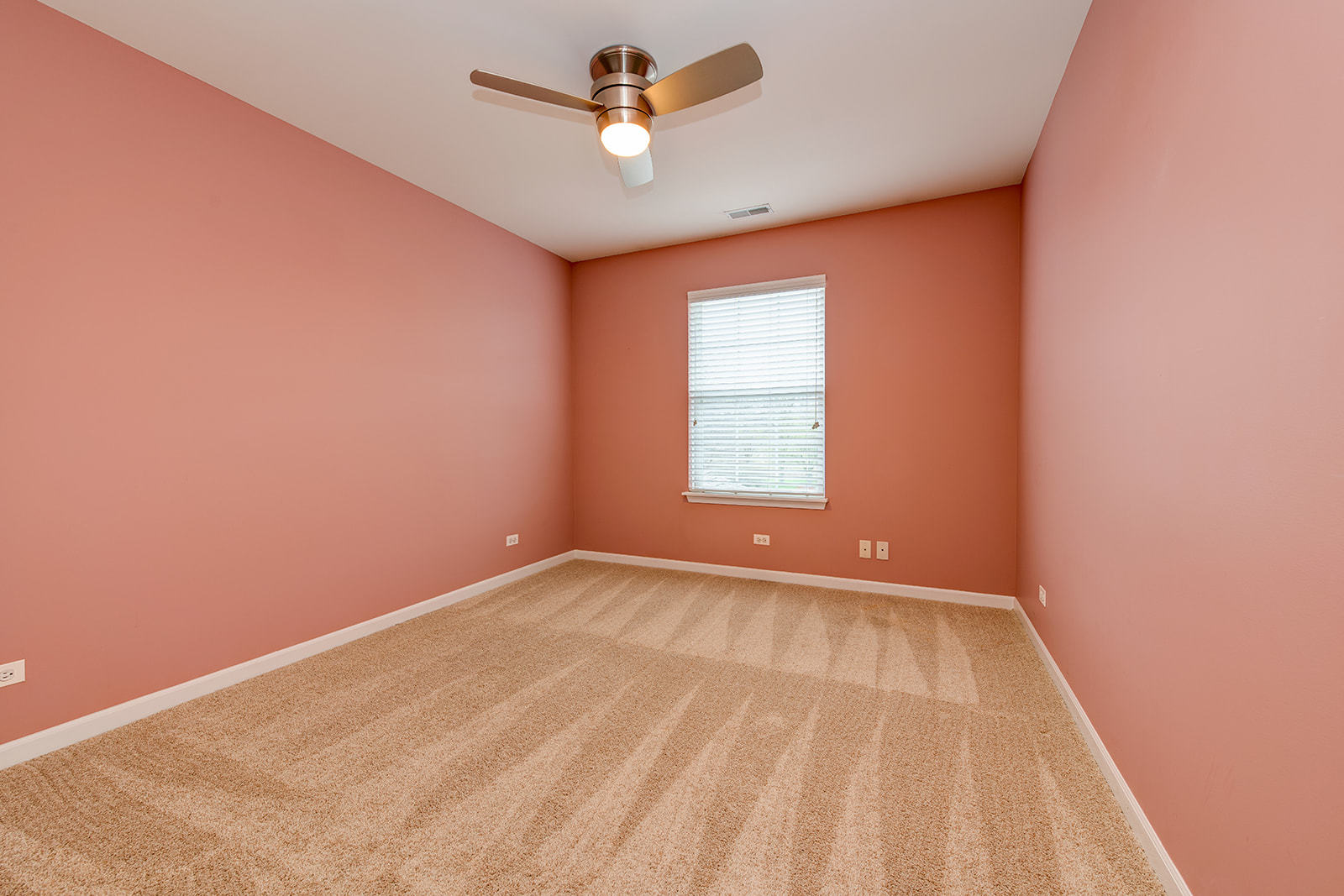 866 Deer Path Drive Antioch, IL 60002 - Photo 20 of 28 an empty room with a window and a fan