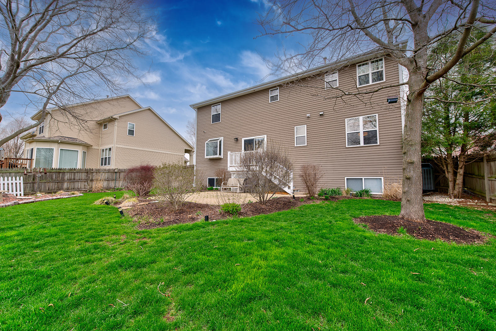 866 Deer Path Drive Antioch, IL 60002 - Photo 24 of 28 a front view of house with yard and outdoor seating