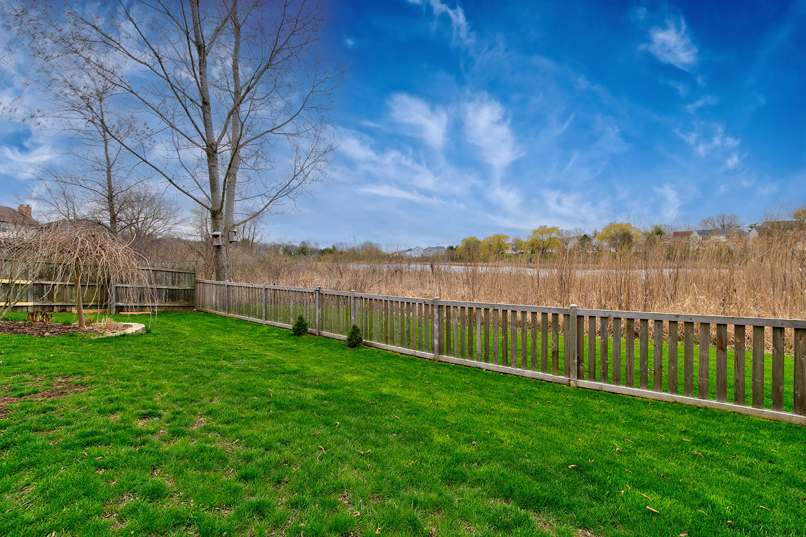 866 Deer Path Drive Antioch, IL 60002 - Photo 25 of 28 a view of a yard with wooden fence