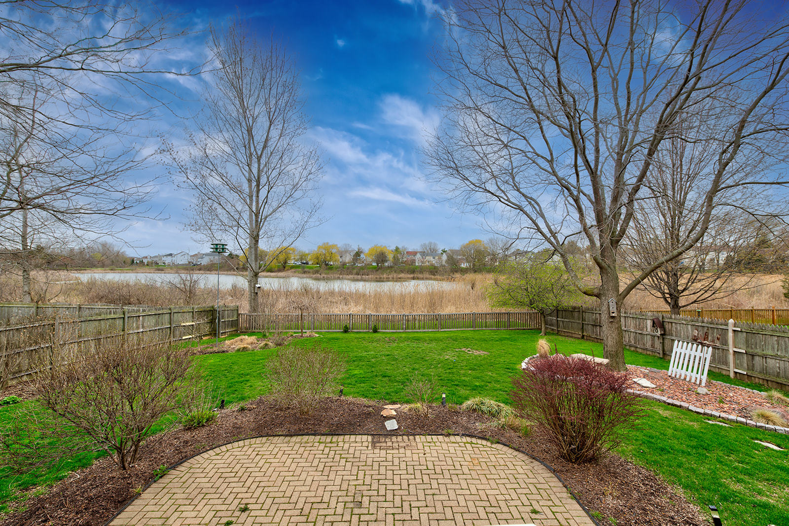 866 Deer Path Drive Antioch, IL 60002 - Photo 27 of 28 a view of a backyard with plants and lake view