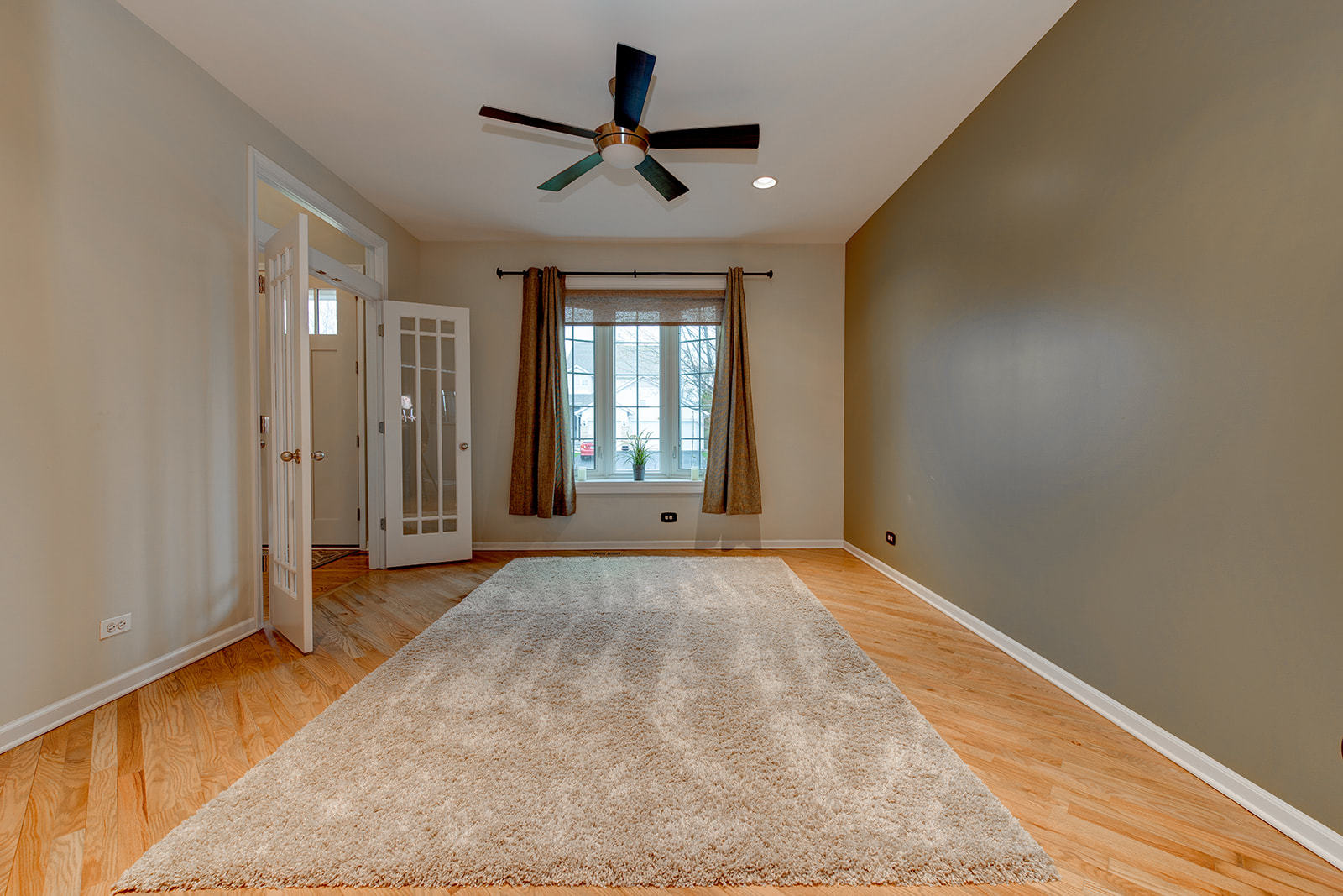 866 Deer Path Drive Antioch, IL 60002 - Photo 3 of 28 an empty room with ceiling fan and windows