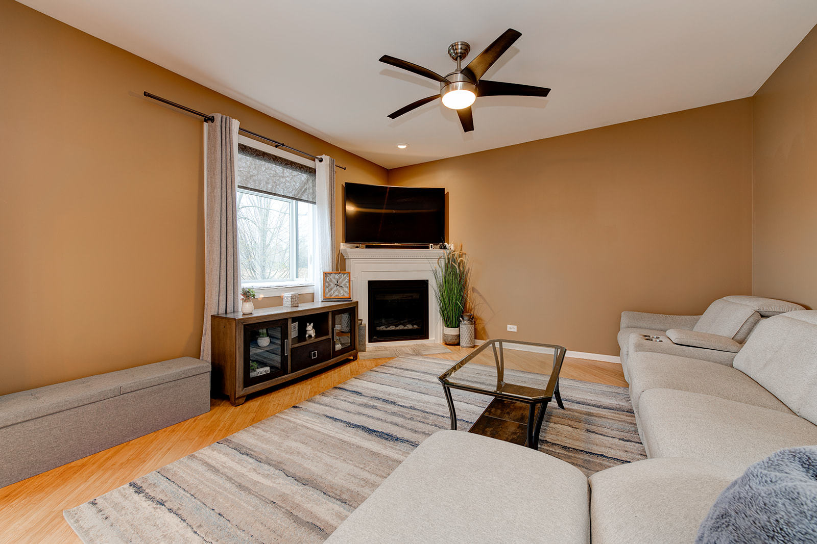 866 Deer Path Drive Antioch, IL 60002 - Photo 9 of 28 a living room with furniture and a fireplace