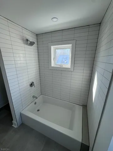 a bathroom with a bathtub