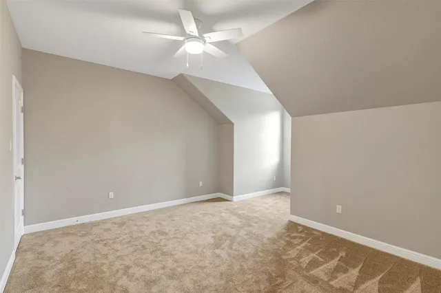 a bathroom with a sink a toilet and shower a mirror