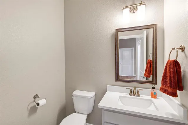 a bathroom with a sink a toilet and a bathtub