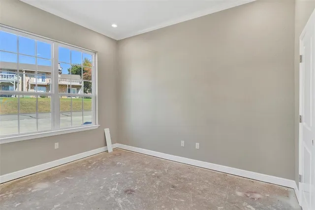a living room with furniture and window