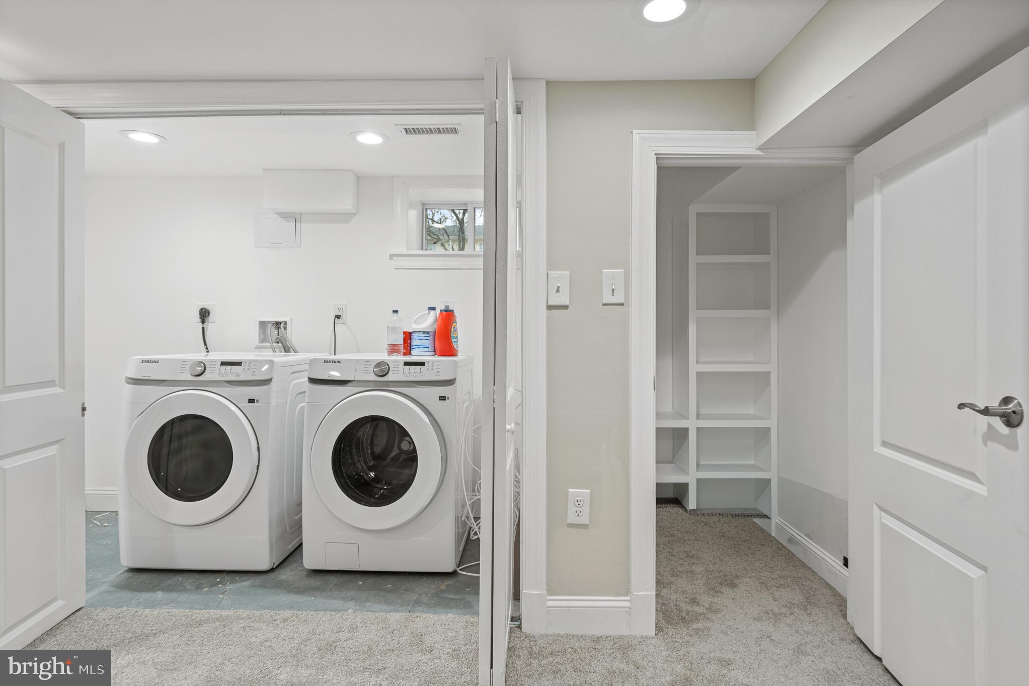 9217 Fowler Lane Lanham, MD 20706 - Photo 54 of 80 a utility room with dryer and washer