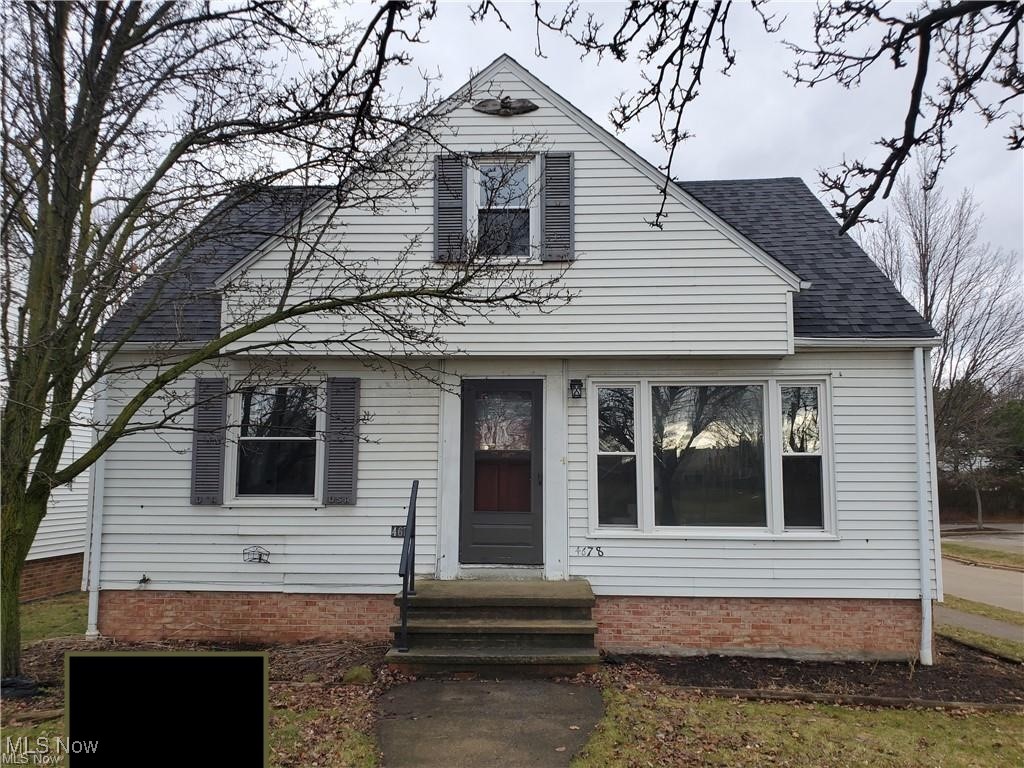 4678 Ridge Road Brooklyn, OH 44144 - Photo 1 of 17 View of front of house with entry steps and roof with shingles