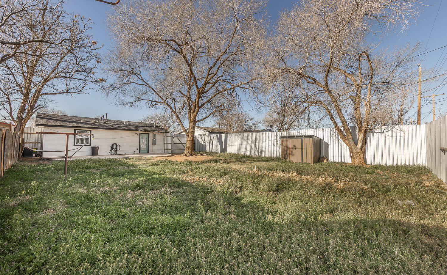 4816 40th Street Lubbock, TX 79414 - Photo 18 of 21 a view of a house with a yard