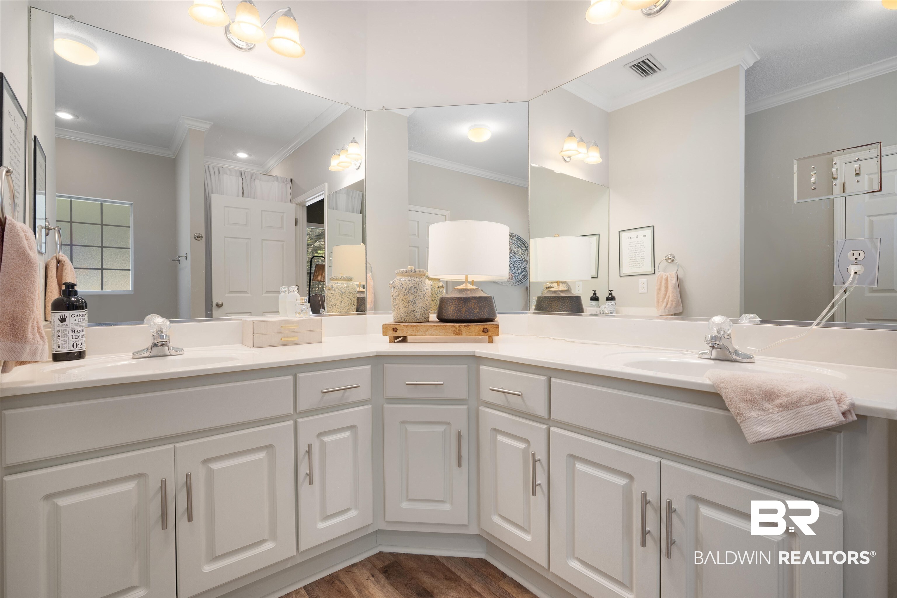 27288 Parker Lane Daphne, AL 36526 - Photo 16 of 29 Full bathroom with double vanity, crown molding, and dark wood-style flooring