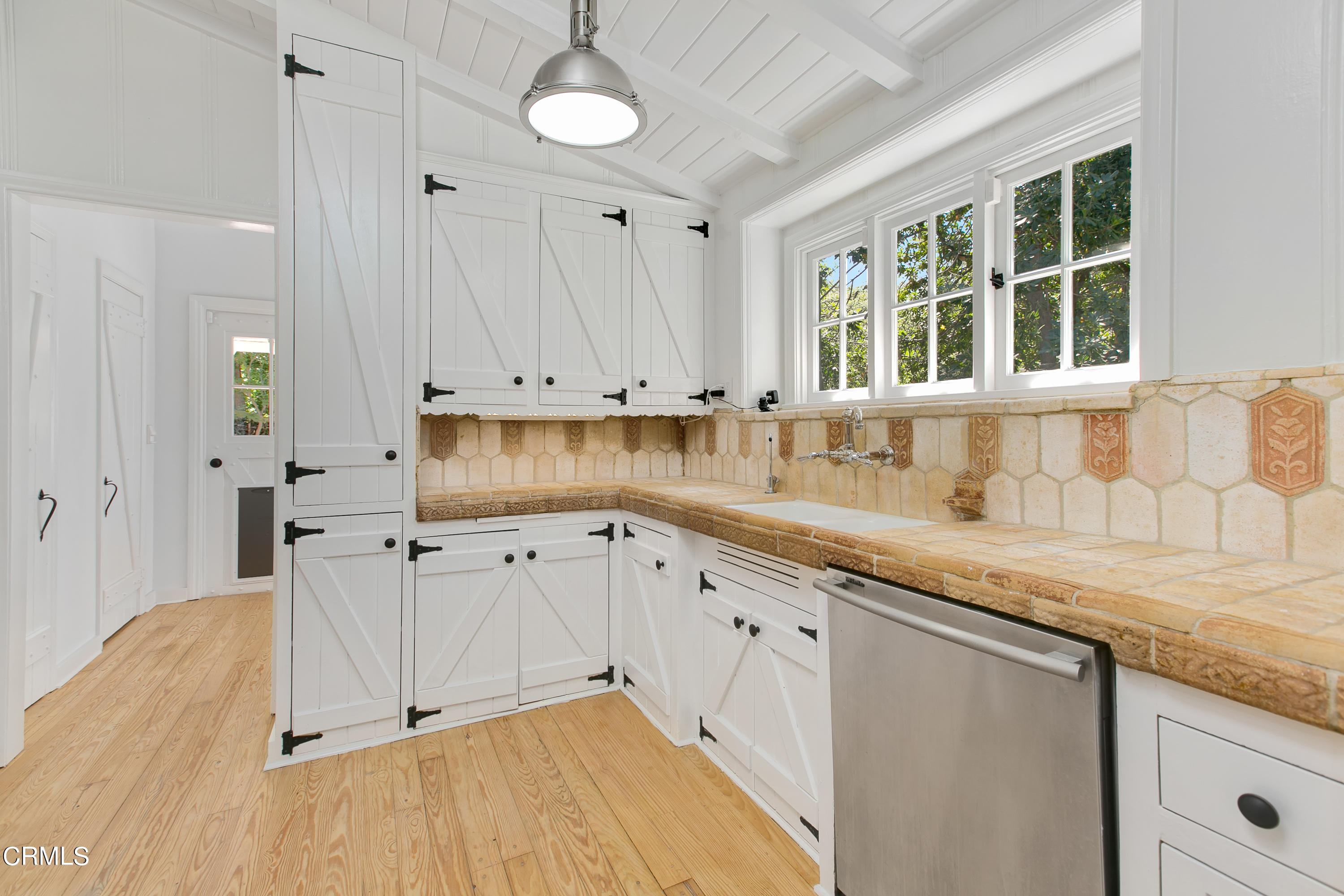 4904 Hampton Road La Canada Flintridge, CA 91011 - Photo 9 of 20 a kitchen with granite countertop white cabinets and sink