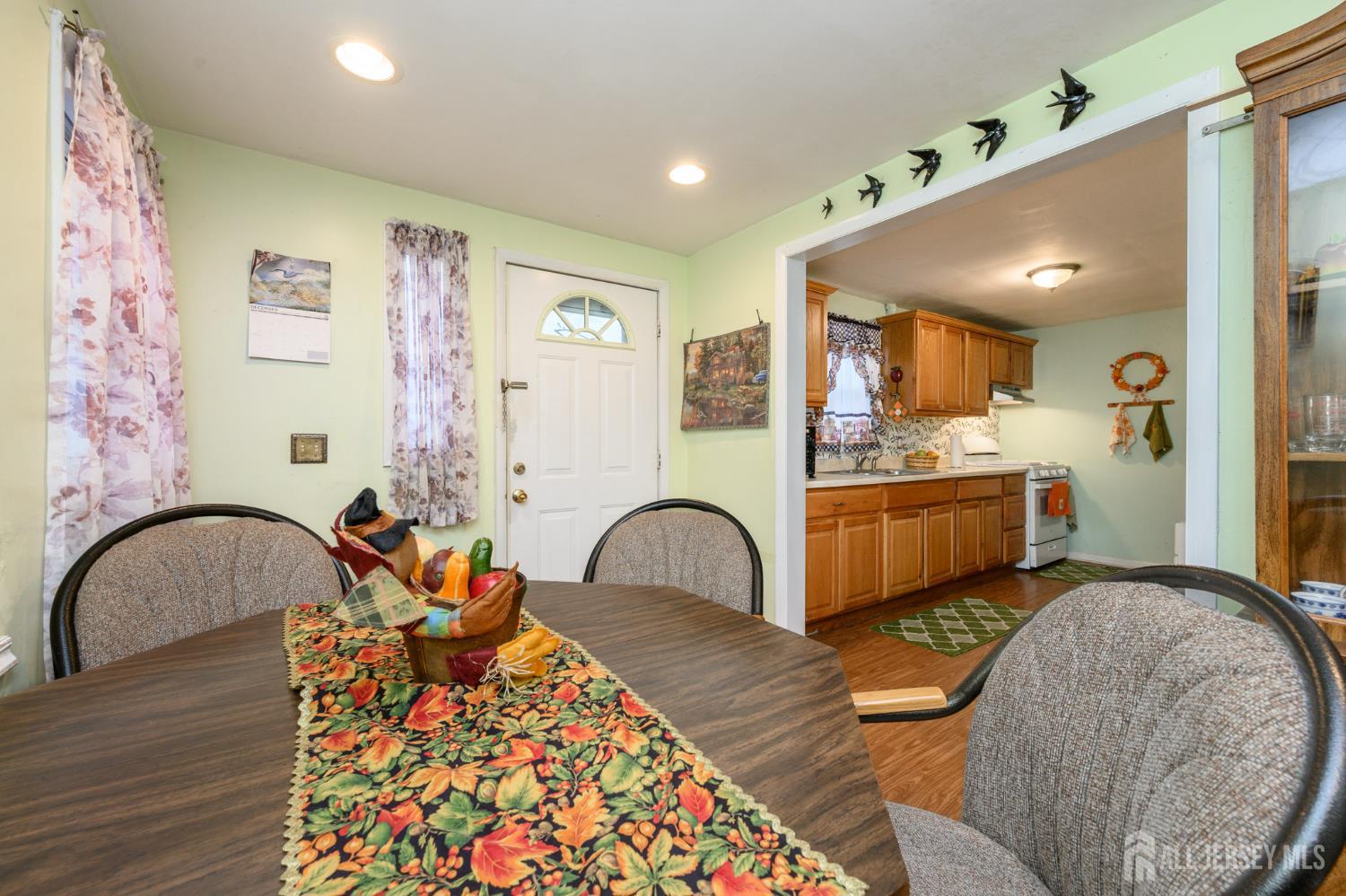 4 Homestead Avenue Avenel, NJ 07001 - Photo 12 of 40 a living room with furniture pool and bedroom