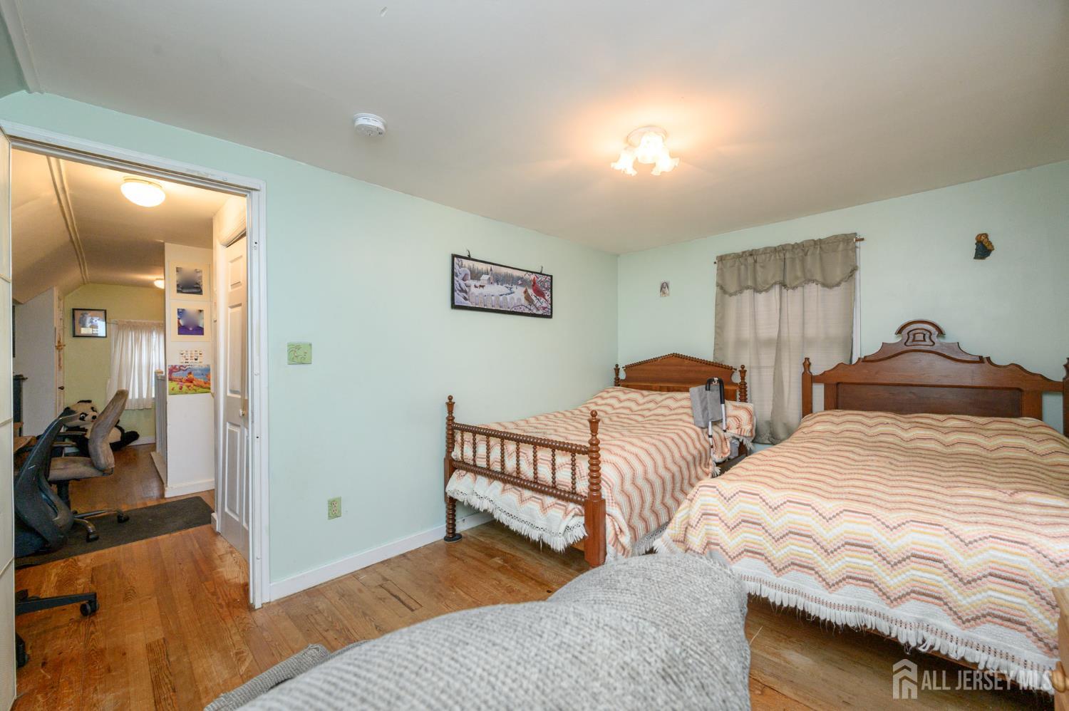 4 Homestead Avenue Avenel, NJ 07001 - Photo 21 of 40 a bedroom with two beds and a view of bedroom