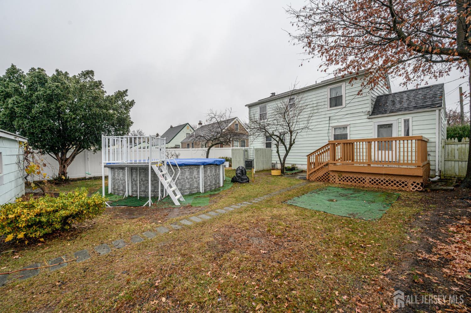 4 Homestead Avenue Avenel, NJ 07001 - Photo 31 of 40 a view of a house with a yard