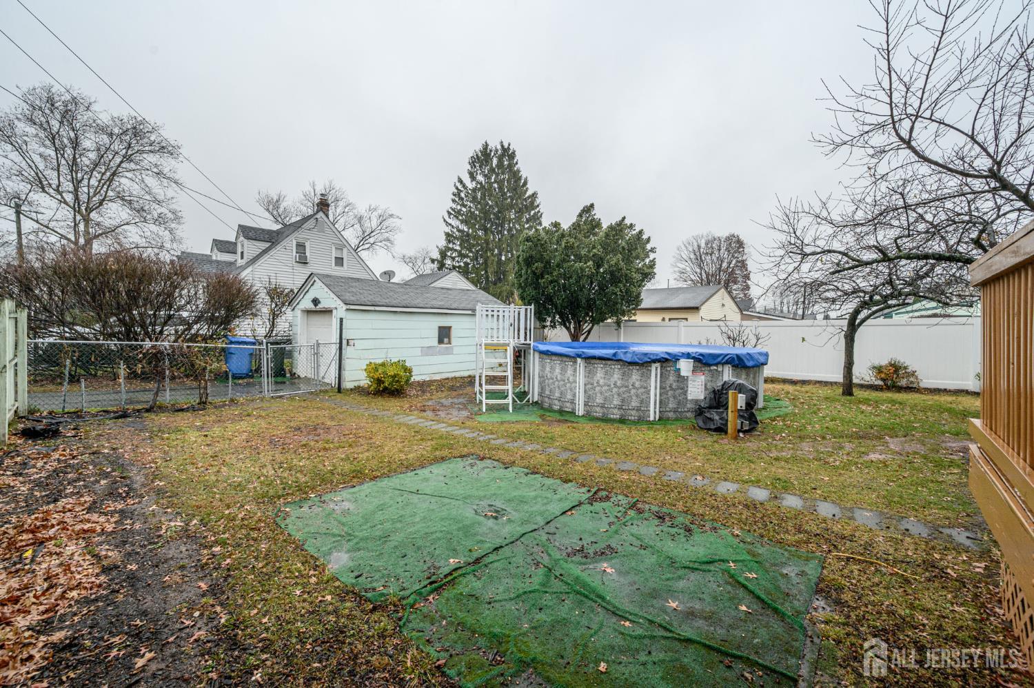 4 Homestead Avenue Avenel, NJ 07001 - Photo 32 of 40 a house view with a garden space