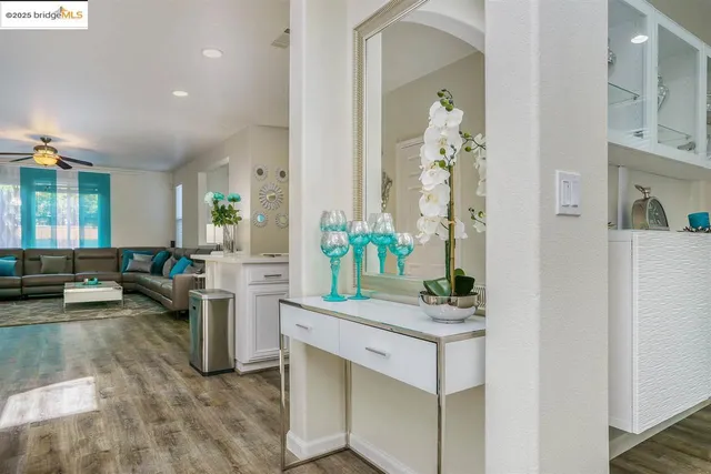 a living room with furniture and a table