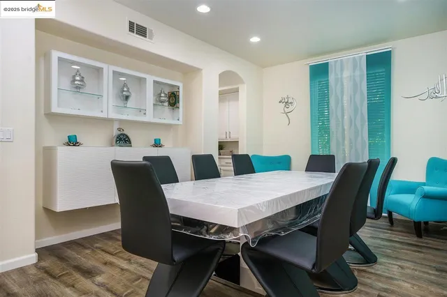 a view of a dining room with furniture