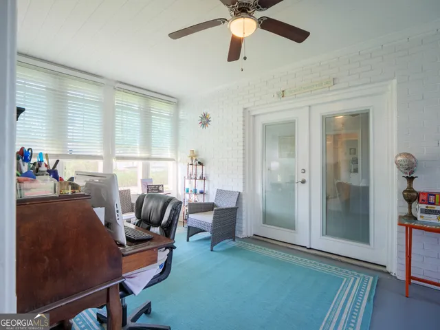 a bedroom with bed and a couch