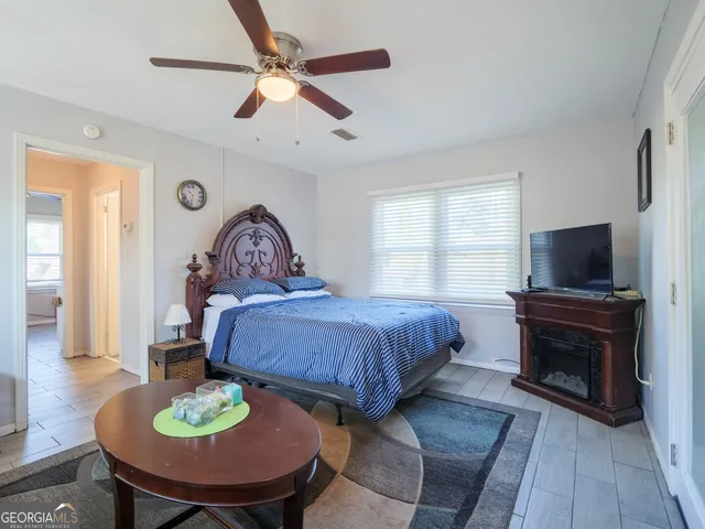 a kitchen with cabinets and window