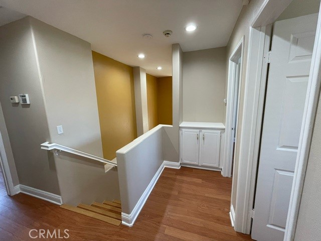 6212 Jasmine Way Cypress, CA 90630 - Photo 6 of 14 a view of a hallway with wooden floor