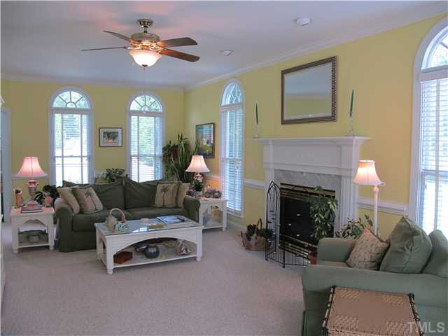 13300 Melvin Arnold Road Raleigh, NC 27613 - Photo 7 of 13 spacious and light and bright. Exits to screen porch Living Room