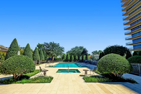 a view of a swimming pool and outdoor space