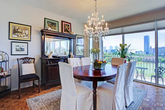 a view of a dining room with furniture window and outside view