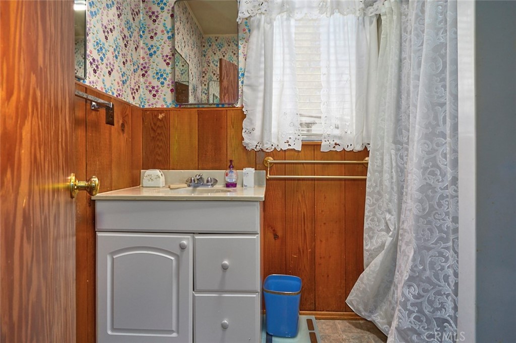 1244 Lark Road Wrightwood, CA 92397 - Photo 15 of 26 a bathroom with a sink and a mirror
