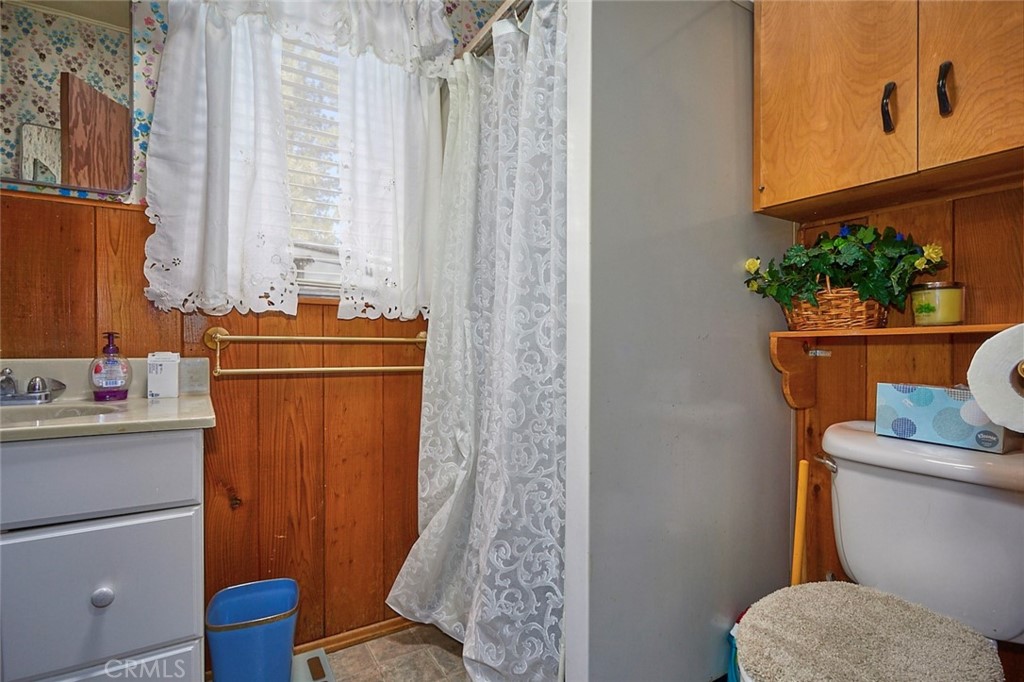 1244 Lark Road Wrightwood, CA 92397 - Photo 16 of 26 a bathroom with a toilet and a shower