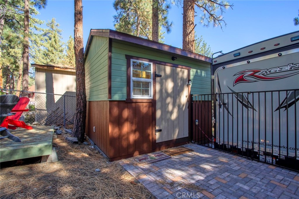 1244 Lark Road Wrightwood, CA 92397 - Photo 22 of 26 a view of a car park in front of house