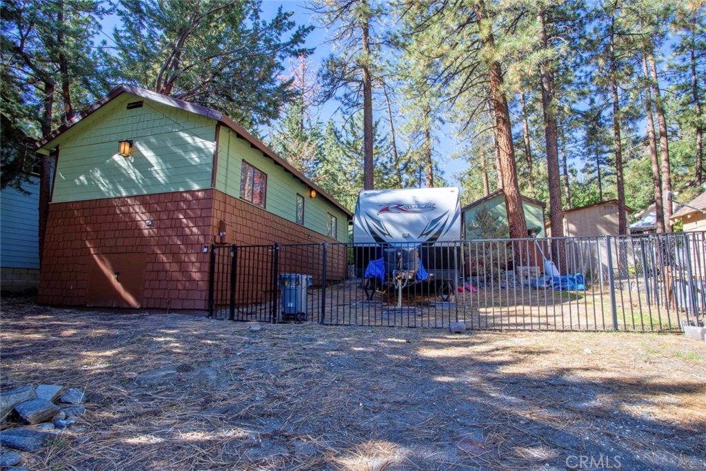 1244 Lark Road Wrightwood, CA 92397 - Photo 26 of 26 a view of a house with a yard and sitting area