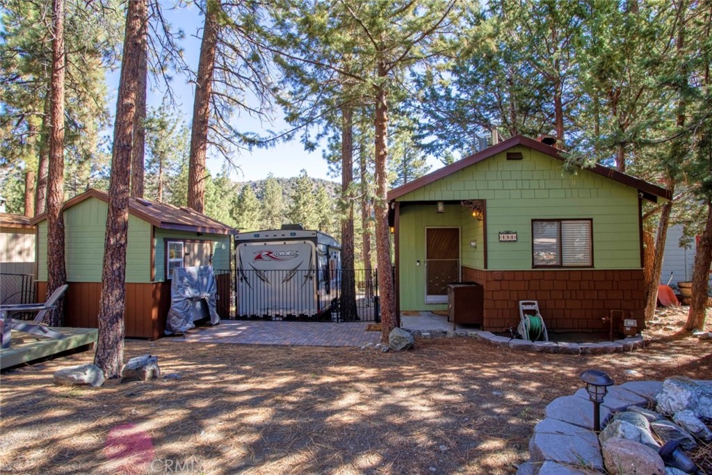 1244 Lark Road Wrightwood, CA 92397 - Photo 5 of 26 a front view of a house with a yard