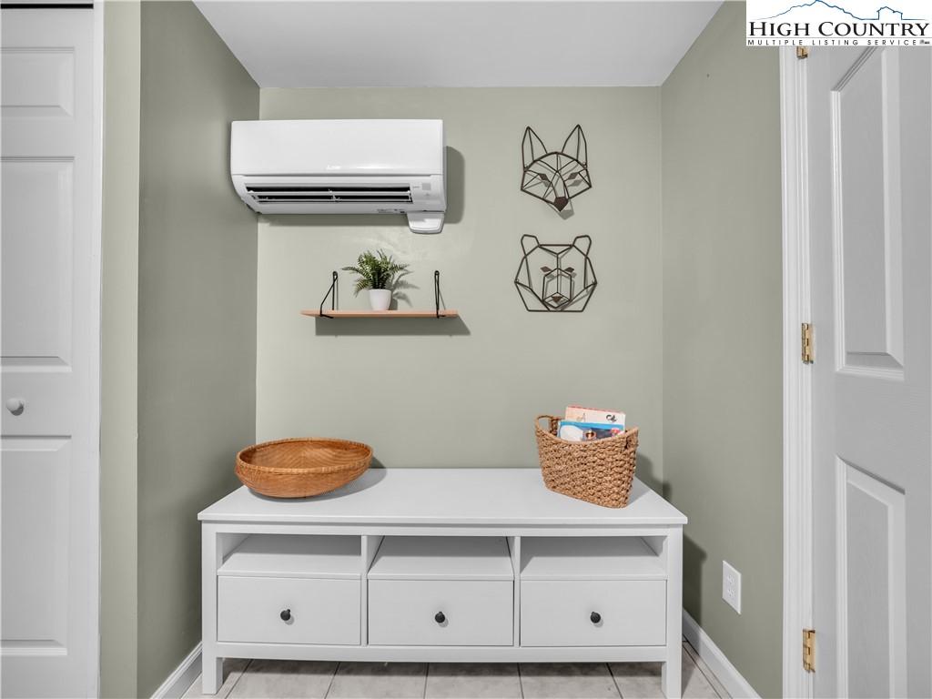 404 Charter Hills Road Beech Mountain, NC 28604 - Photo 32 of 36 a view of table with cabinets