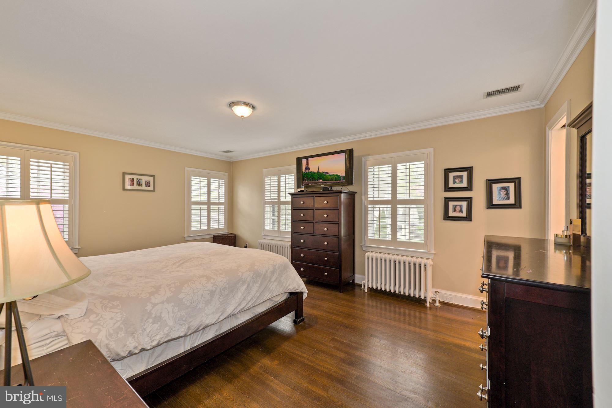 3412 Rittenhouse Street Northwest Washington, DC 20015 - Photo 14 of 33 Spacious primary bedroom with natural light