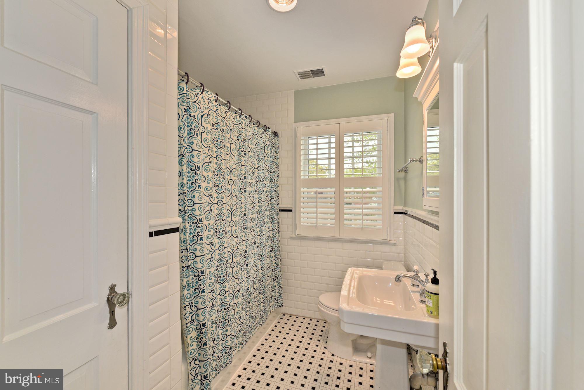 3412 Rittenhouse Street Northwest Washington, DC 20015 - Photo 21 of 33 Full hall bath with linen closet