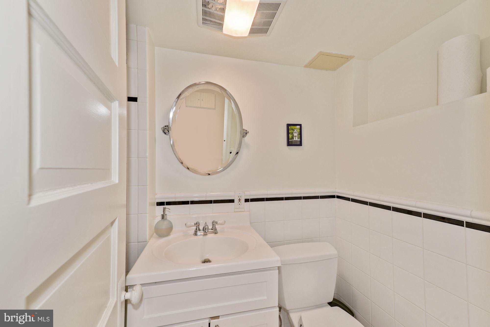 3412 Rittenhouse Street Northwest Washington, DC 20015 - Photo 27 of 33 Lower level full bath with shower