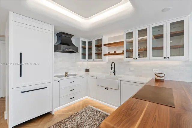 a spacious bedroom with a large bed and a window