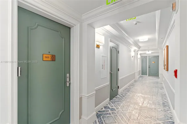 a view of a hallway with wooden shelves