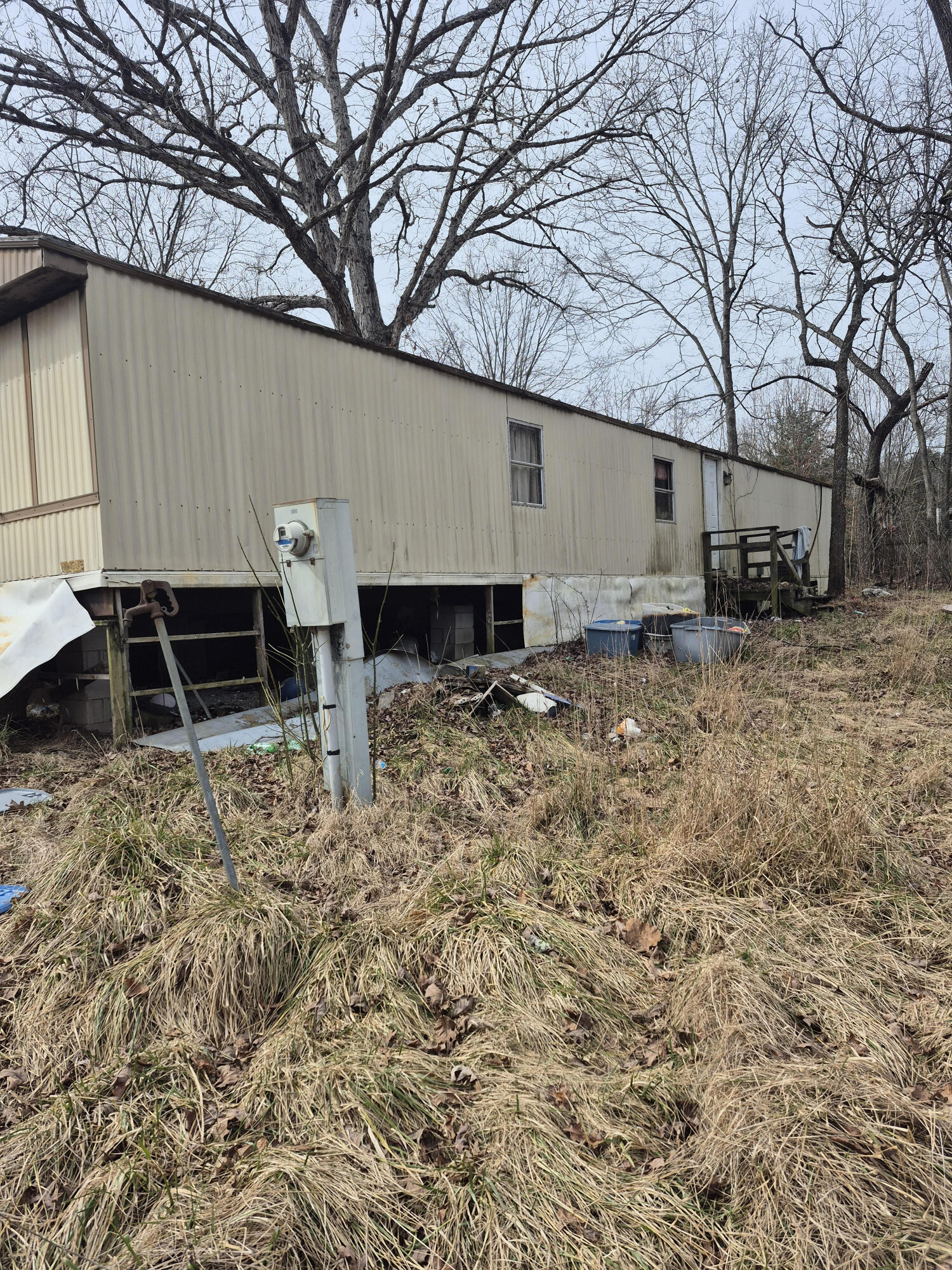 1075 Lithia Road Buchanan, VA 24066 - Photo 3 of 7 a backyard of a house with yard fire pit and furniture