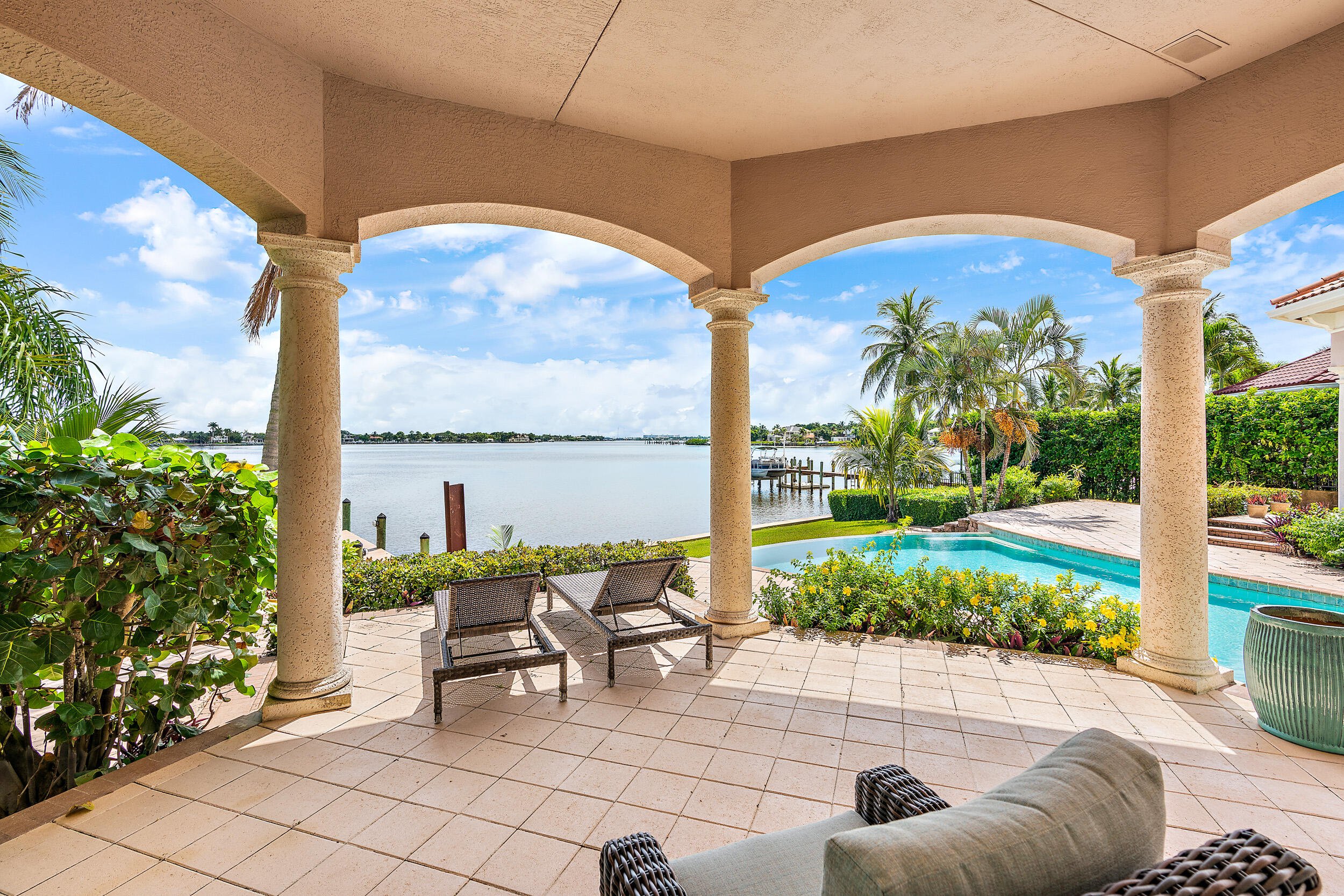 19010 Loxahatchee River Road Jupiter, FL 33458 - Photo 23 of 38 a view of an outdoor dining space with a patio