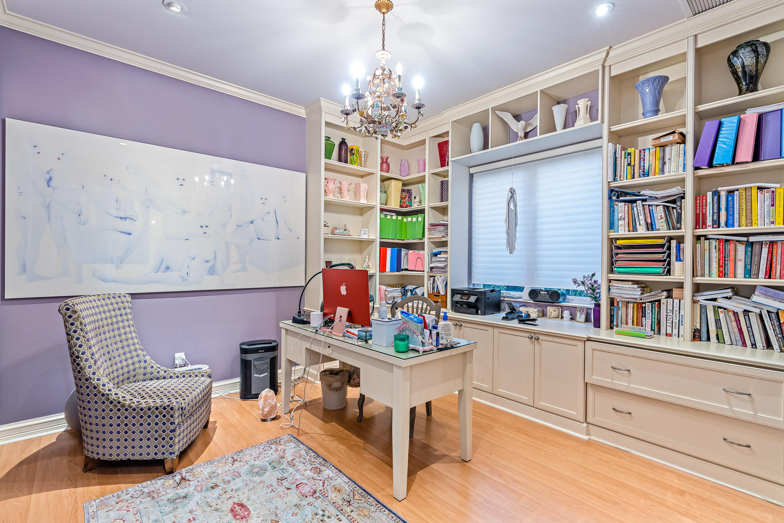 19010 Loxahatchee River Road Jupiter, FL 33458 - Photo 24 of 38 a living room with furniture and a bookshelf