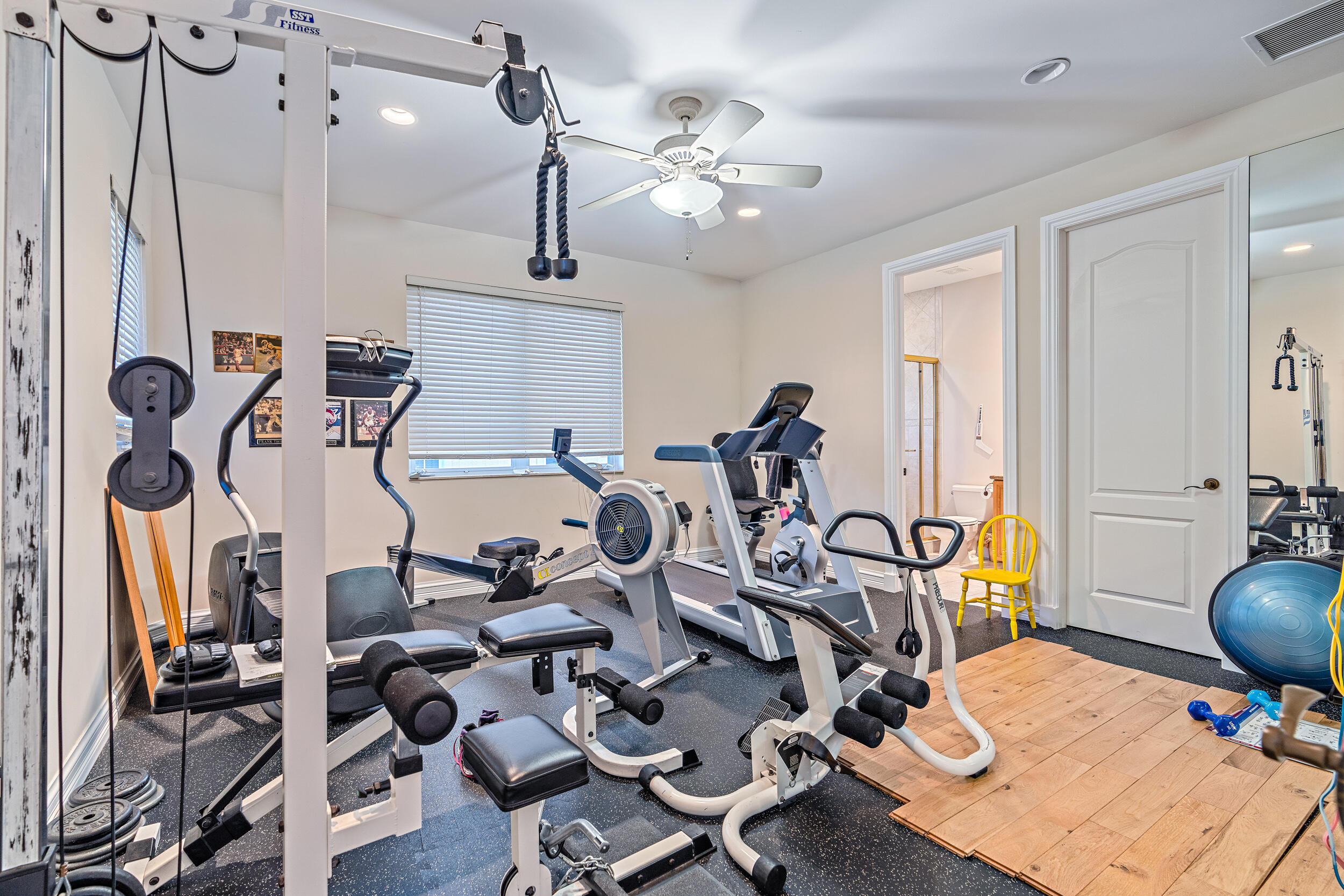 19010 Loxahatchee River Road Jupiter, FL 33458 - Photo 26 of 38 a view of a room with gym equipment