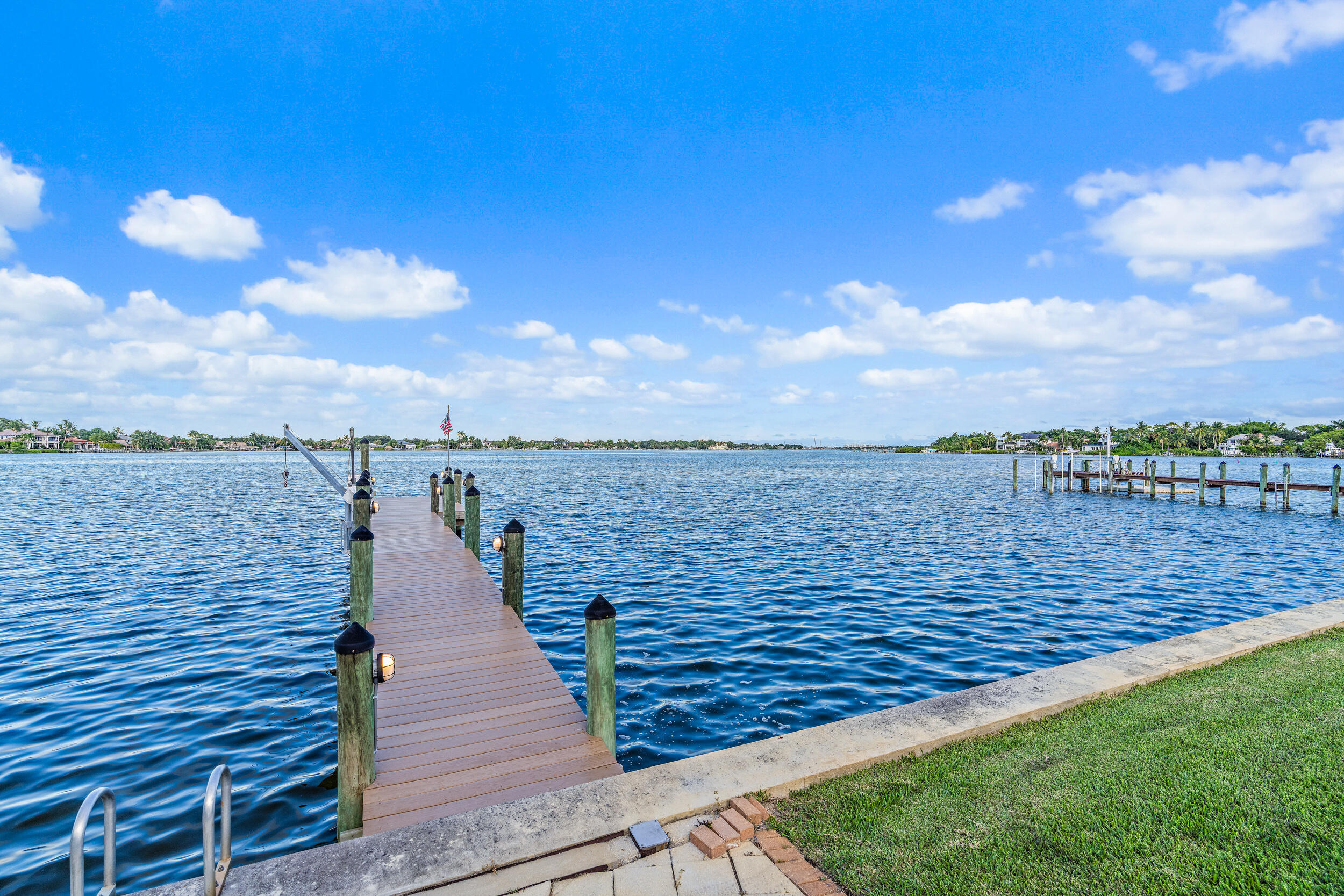 19010 Loxahatchee River Road Jupiter, FL 33458 - Photo 28 of 38 a view of a lake from a yard