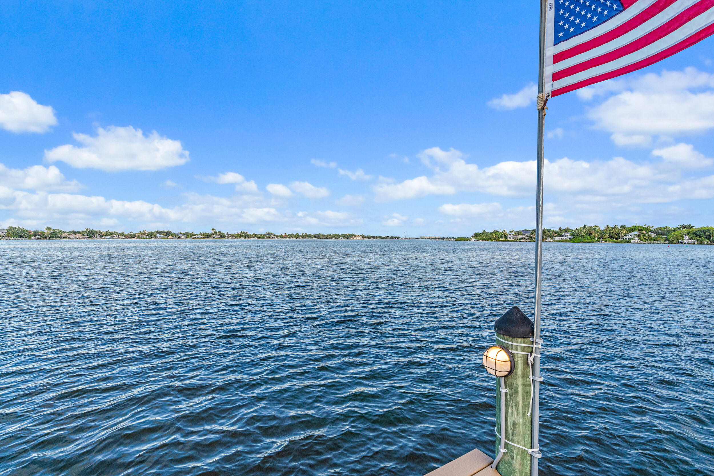 19010 Loxahatchee River Road Jupiter, FL 33458 - Photo 29 of 38 a brick building with a view of lake