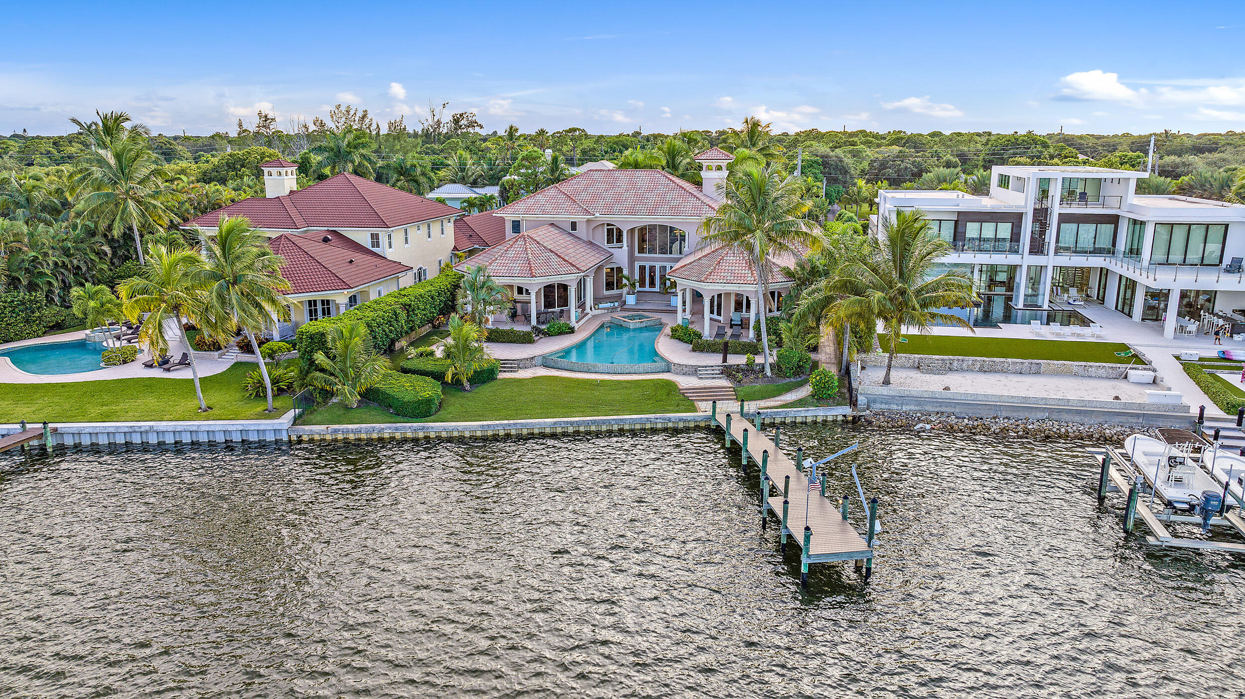 19010 Loxahatchee River Road Jupiter, FL 33458 - Photo 30 of 38 an aerial view of a house with a garden and lake view