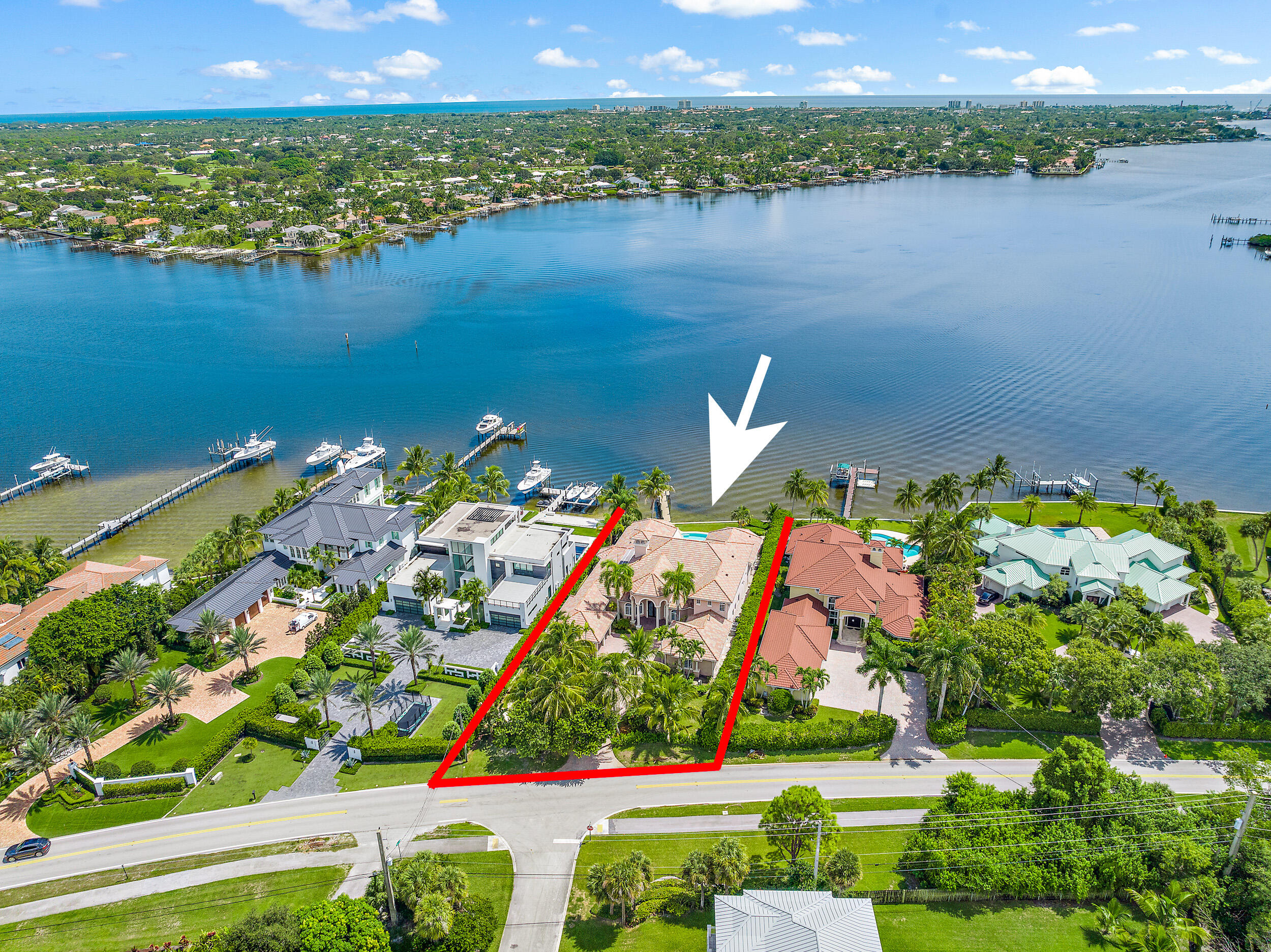 19010 Loxahatchee River Road Jupiter, FL 33458 - Photo 3 of 38 a view of a lake with a lake