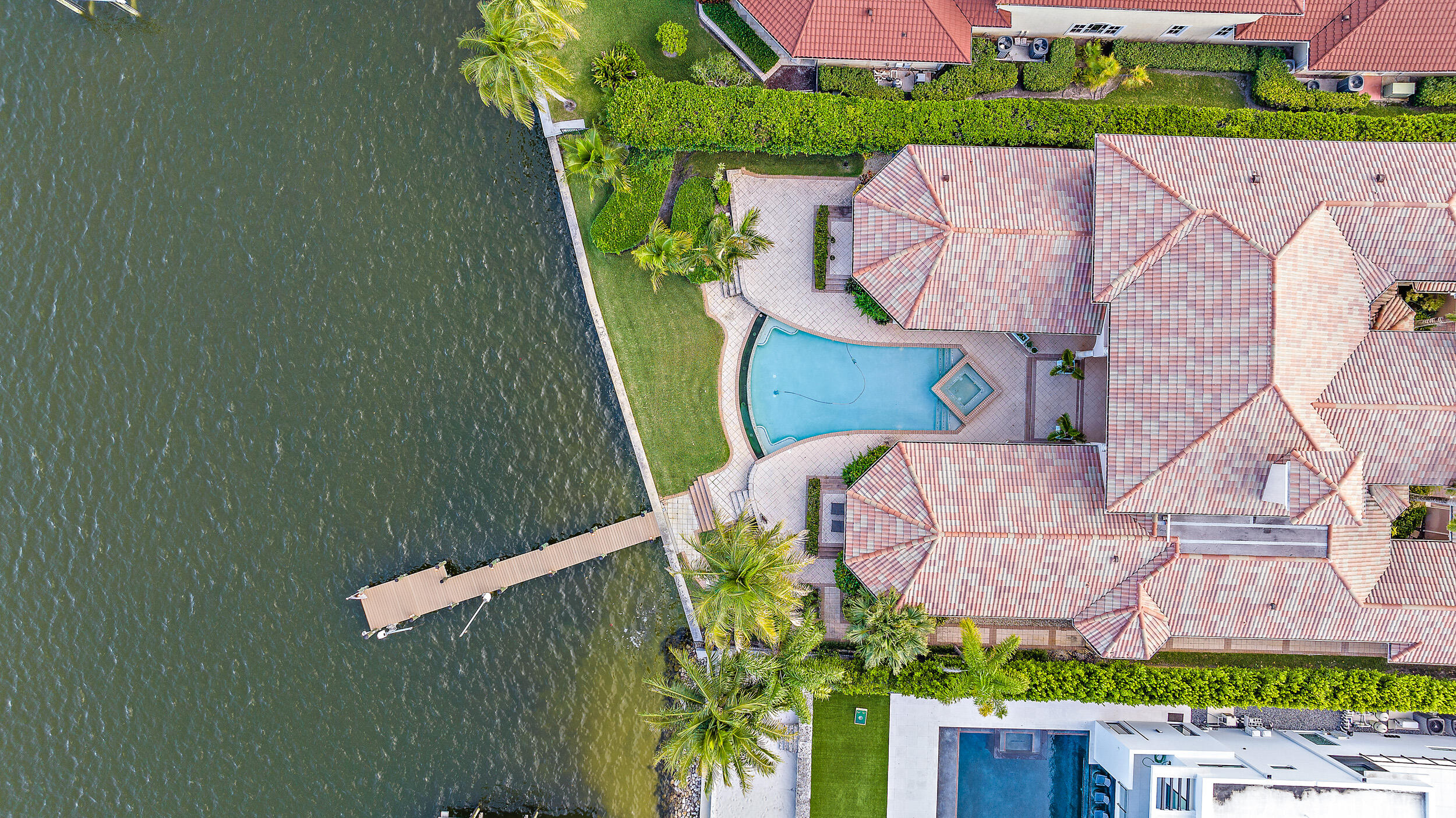 19010 Loxahatchee River Road Jupiter, FL 33458 - Photo 31 of 38 an aerial view of a house with a garden and plants