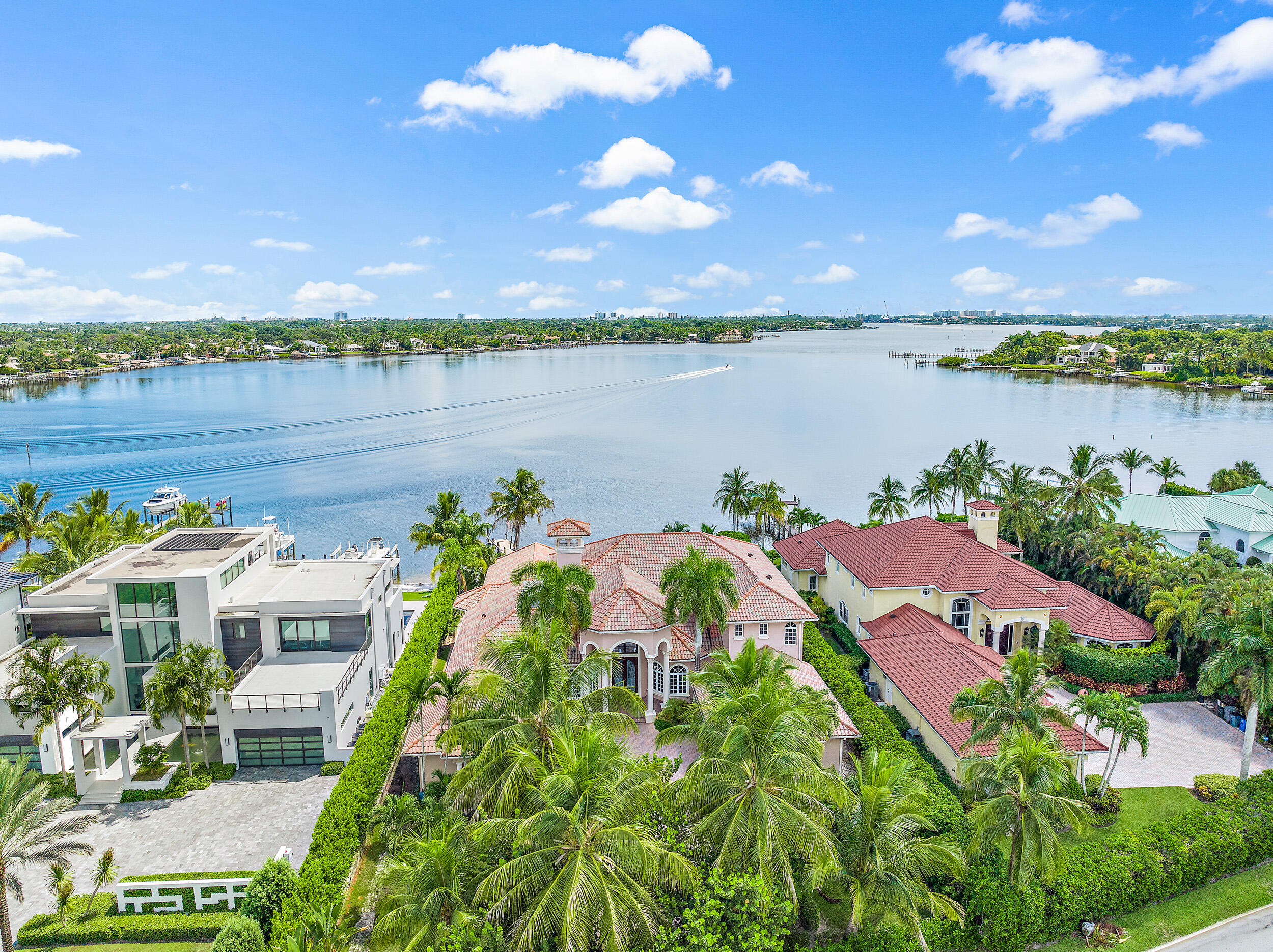 19010 Loxahatchee River Road Jupiter, FL 33458 - Photo 34 of 38 a view of lake with house in background