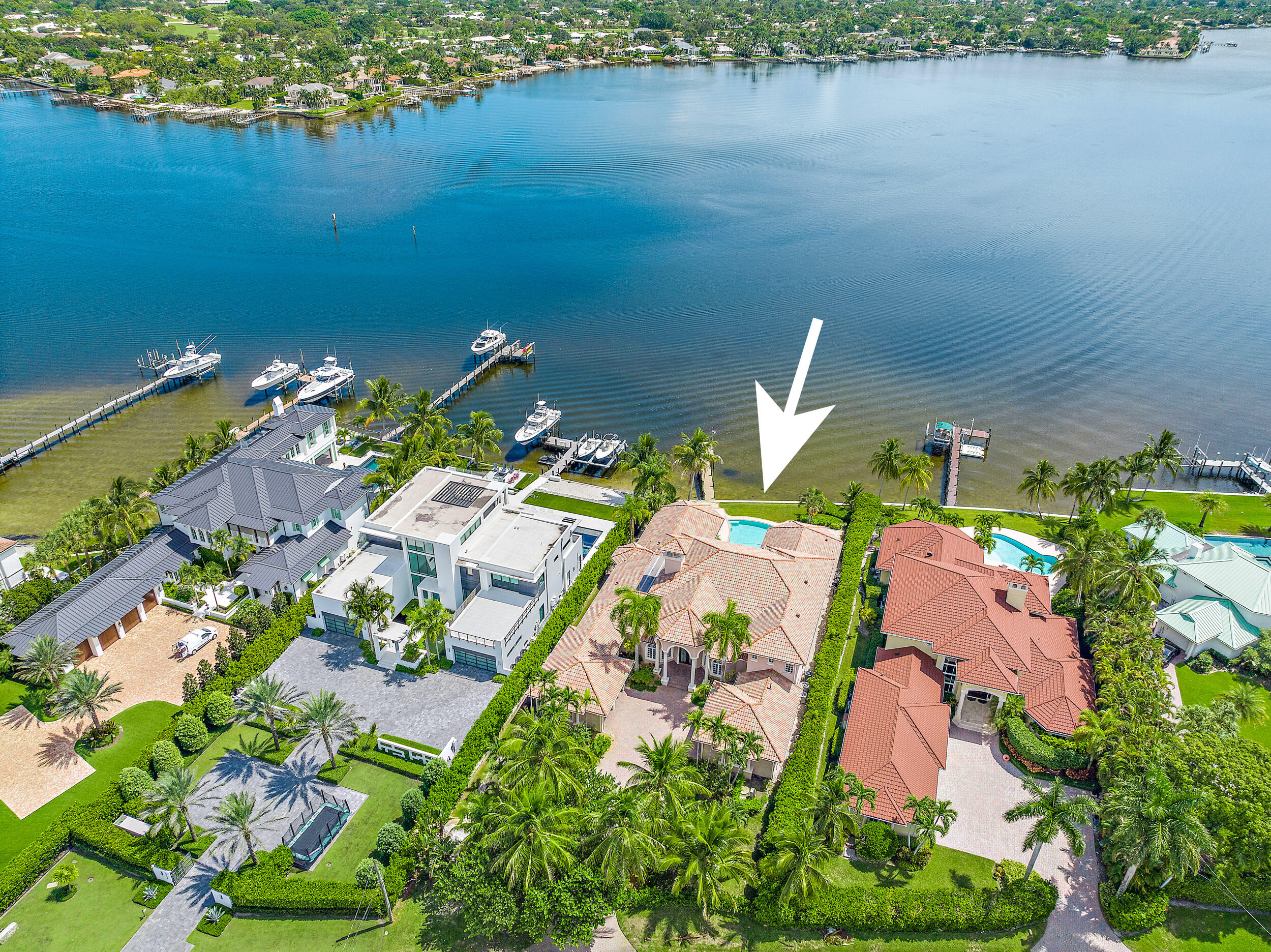 19010 Loxahatchee River Road Jupiter, FL 33458 - Photo 37 of 38 an aerial view of house with yard swimming pool and outdoor seating