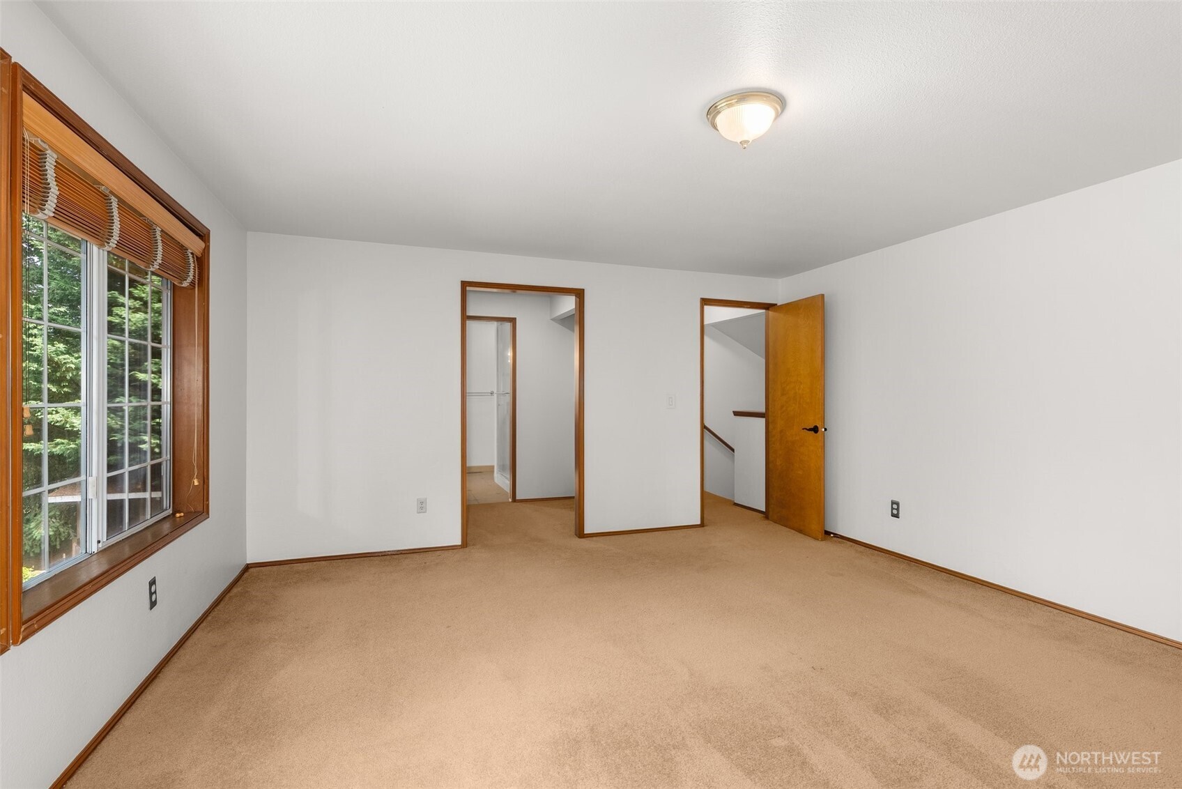 6333 Boardman Road Northwest Olympia, WA 98502 - Photo 19 of 38 a view of an empty room with a window
